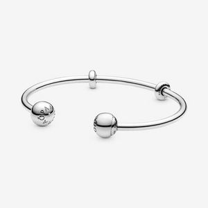 Silver open bangle with silicone stoppers and interchangeable end caps offers at 345 Dhs in Pandora