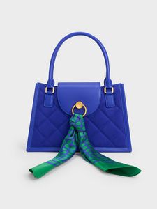 Roza Scarf Quilted Trapeze Bag offers at 1900 Dhs in Charles & Keith