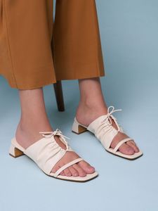 Bow-Tie Ruched Heeled Mules offers at 36 Dhs in Charles & Keith