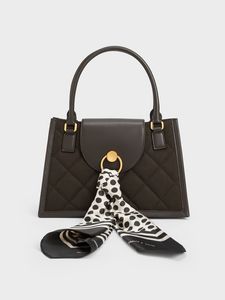 Roza Scarf Quilted Trapeze Bag offers at 1900 Dhs in Charles & Keith