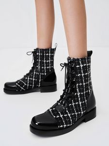 Tweed & Patent Combat Boots offers at 1500 Dhs in Charles & Keith