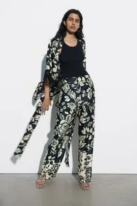 STRAIGHT FIT PRINTED TROUSERS offers at 199 Dhs in Zara